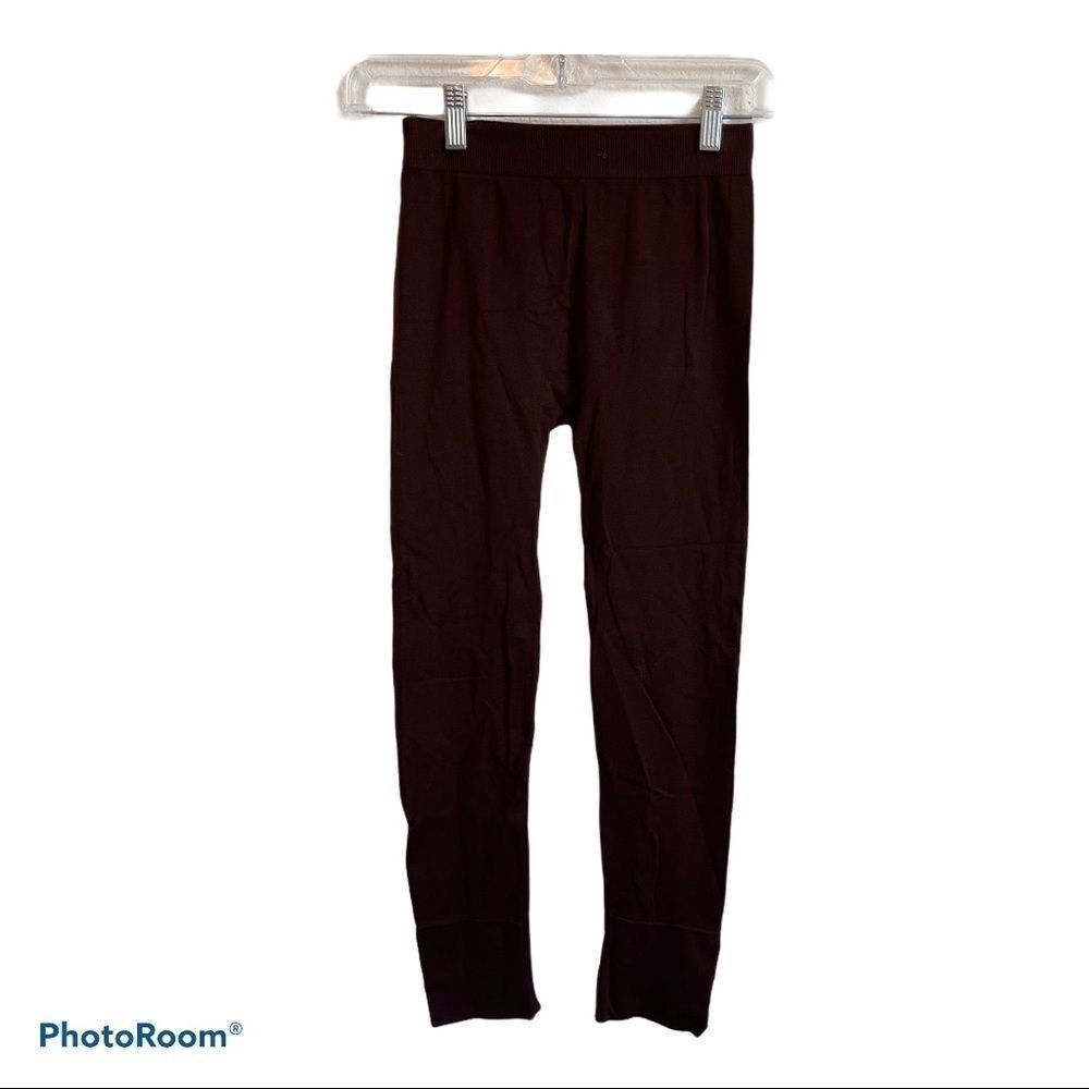‎Brown Leggings with Rhinestone at bottom edge.